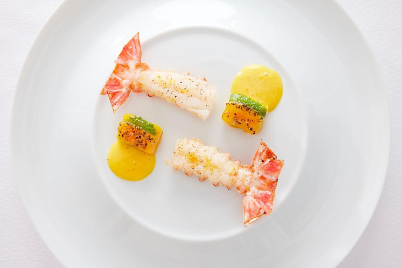Lausanne Palace Bagian luar foto A prawn dish at the restaurant